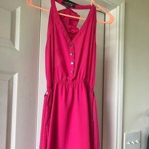 Pretty pink dress with ruffled back!